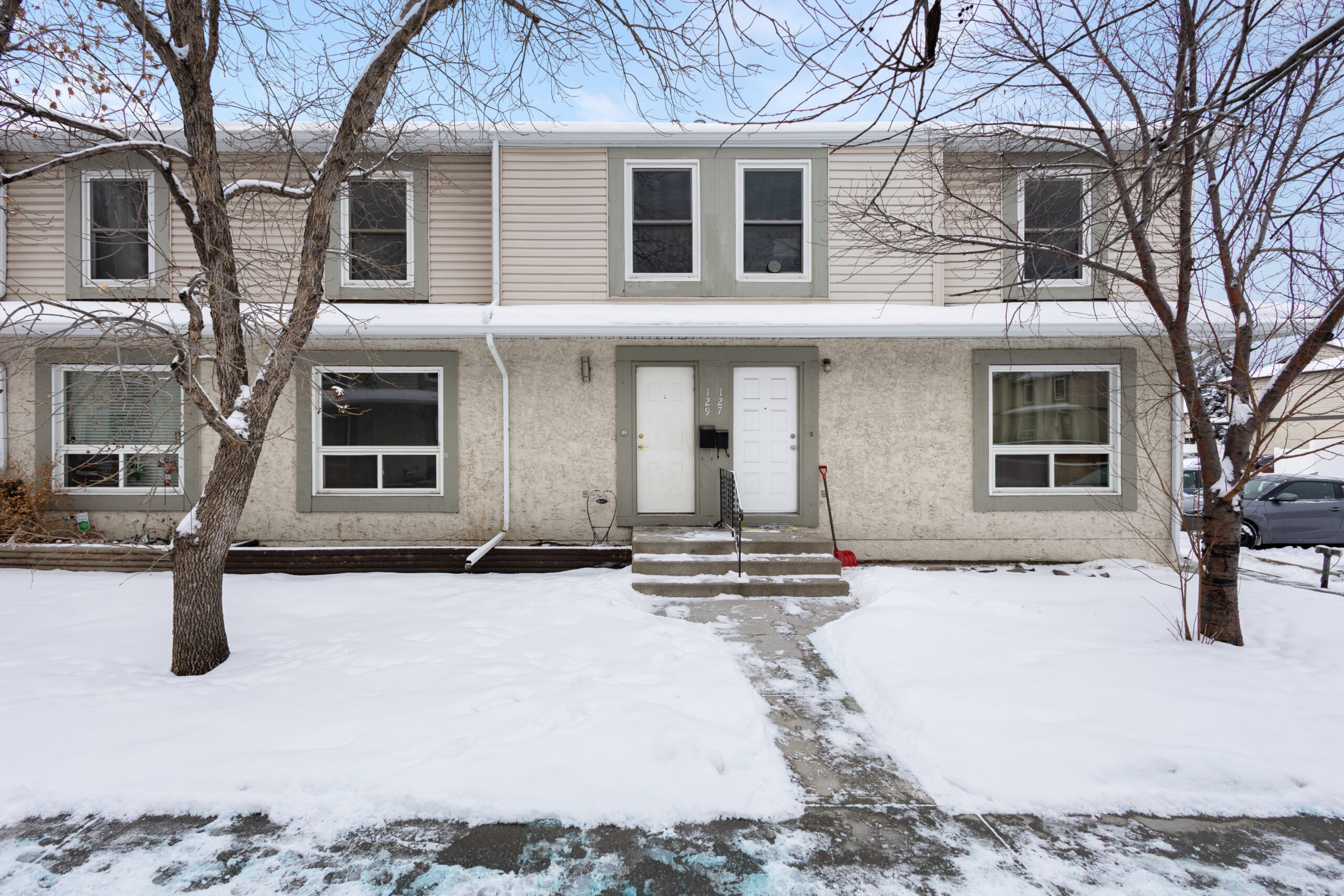 Exterior of a house purchased by MyHomeOptions in the Calgary area